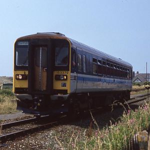 153379 departs from Aberdovey enroute to Machynlleth, on a sweltering Saturday afternoon, July 1994.
