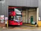 an Ipswich Reds Wright StreetDeck bus, number plate BN72 TVF, sign on the garage saying 4.2m