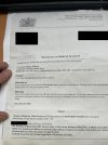 Summons-REDACTED.jpg