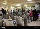 ticket-barriers-at-a-london-underground-station-FGM2NN.jpg