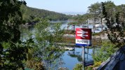 278. Duncraig station totem with Plockton across the bay.JPG