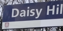 Daisy Hill station sign, GMPTE is in the corner.