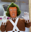 Donald Trump as a bright orange Oompa Loompa