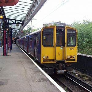Class 313 arriving at Drayton Park with a service from Moorgate