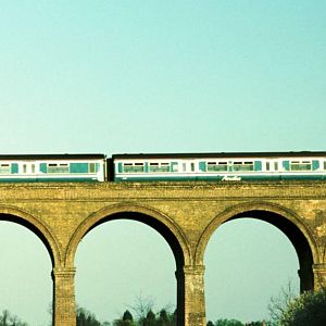 Old Anglia liveried 150/1 crossing Chappel Viaduct in 2002