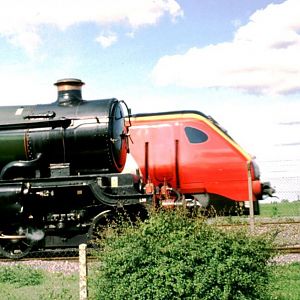 Old and new at Didcot.  I spent all day waiting for this shot.  5051 - Vgr number obscured.  (Aug 2002)