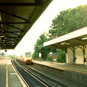 Voyager arriving at Basingstoke.  Not unusual now, but this was my first Voyager shot on the former SR. (Sep 2002)