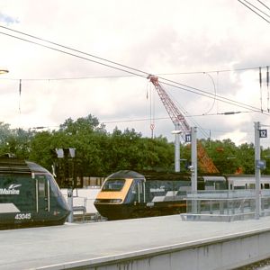 43053 arrives on the front of a reverse-formed express from Nottingham into Platform 10 of the St Pancras temporary station, 43045 still waiting in Pl