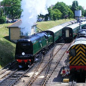 Southern Locomotives Ltd owned Bullied Battle of Britain class Pacific No. 34070 ‘Manston’ steams out of Swanage station with a train for Norden on 16