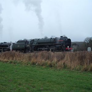 LMS Black 5 No. 44871 and BR Standard 7P No. 70013 Oliver Cromwell leaving a siding near Craven Arms on a dull 2nd April 2010, while working 'light en