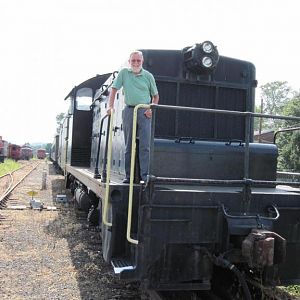 Me on the front of PRR-9408 EMD class ES-6 model SW-1.