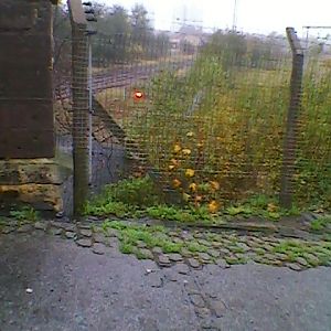 For some reason, a shunting signal is still intact by the disused sidings!