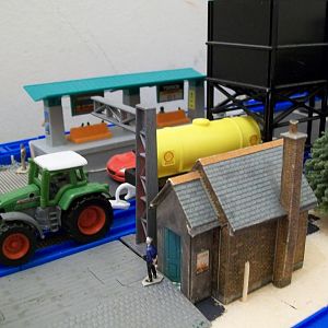 At a few locations, some tractors can be used for shunting, so here is a SIKU Fendt model, with a Tomy train coupling (almost a perfect fit, funnily e