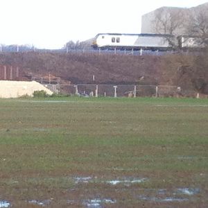 1H58 service heads up to London (traveling left to right across this shot). Presumably the chord will join the existing mainline.  There appear to be