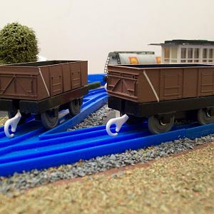 Re-painted Hornby 21 ton mineral wagons.
One of them is quite ancient and started life in the private owner "Norstand" blue  livery, while the other