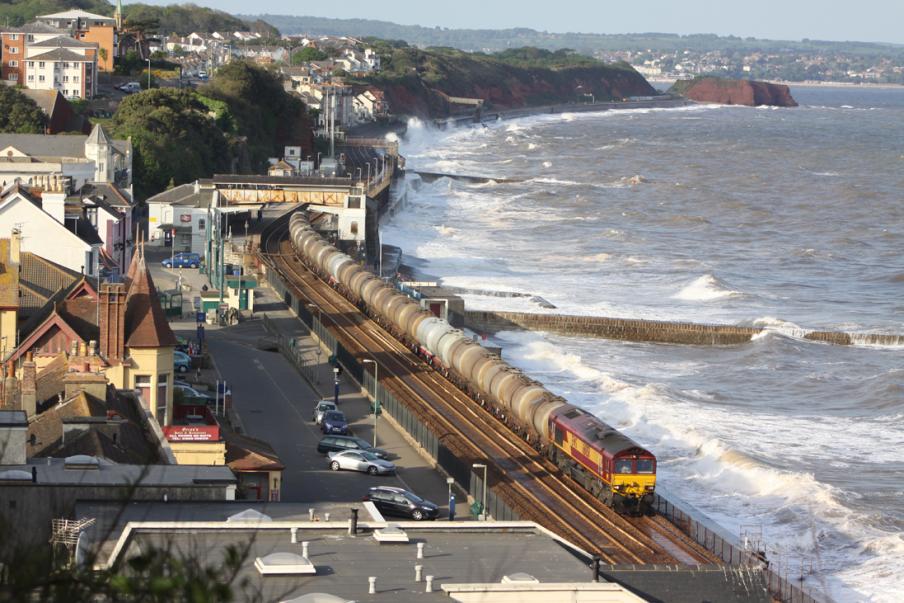 66058 passes though Dawlish on a stormy day