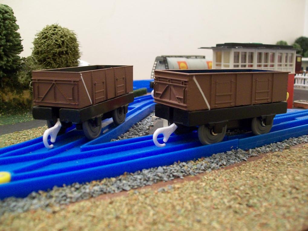 Re-painted Hornby 21 ton mineral wagons.
One of them is quite ancient and started life in the private owner "Norstand" blue  livery, while the other