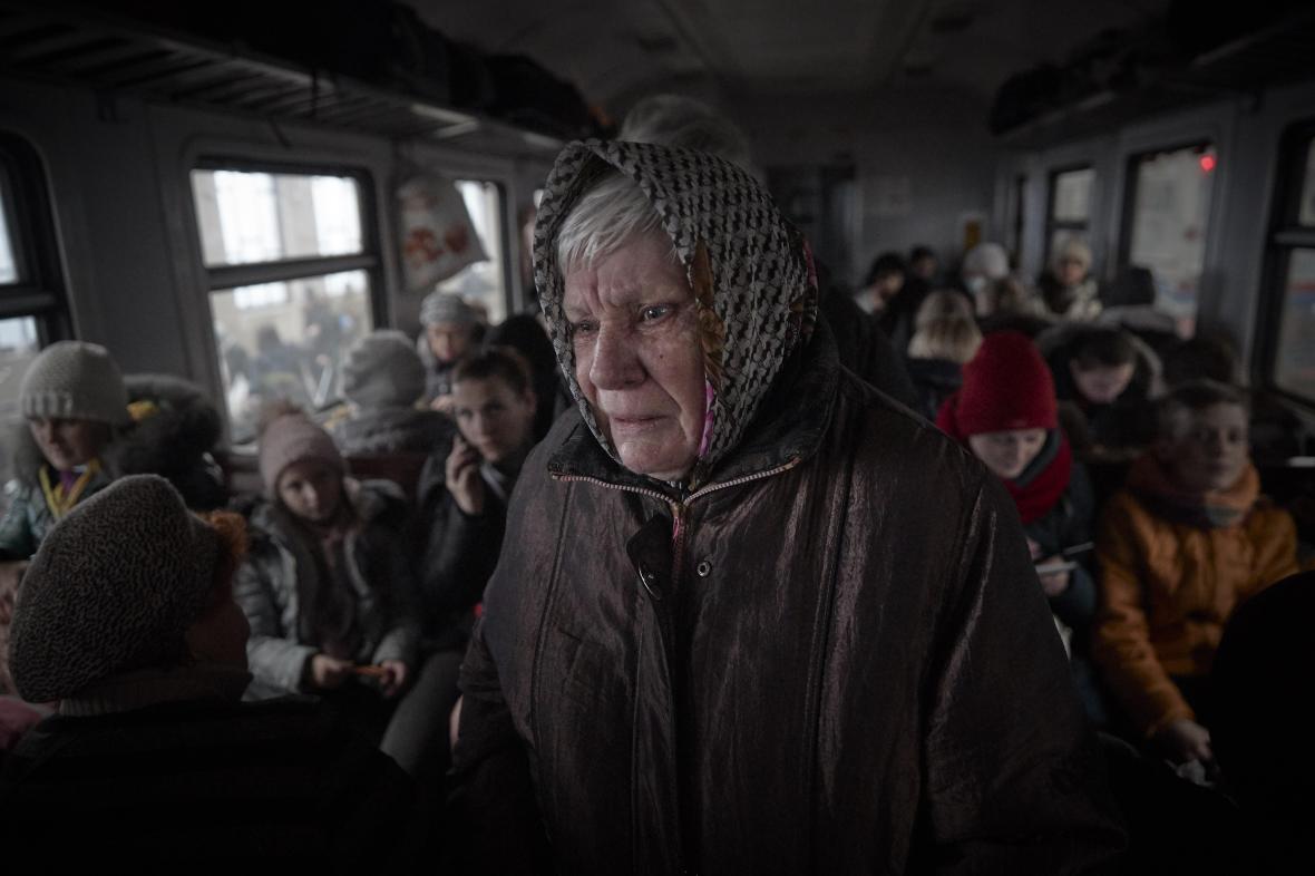 Women and children on a packed train as they start their journey to flee Ukraine