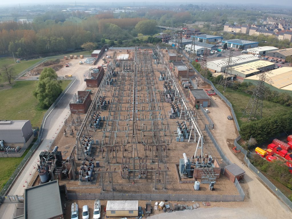 A high angle photo of Little Barford power station showing lots of above ground electricity equipment